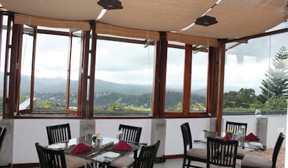 Theva Expressions Sri Lanka Theva restaurant indoor dining room panoramic mountain view