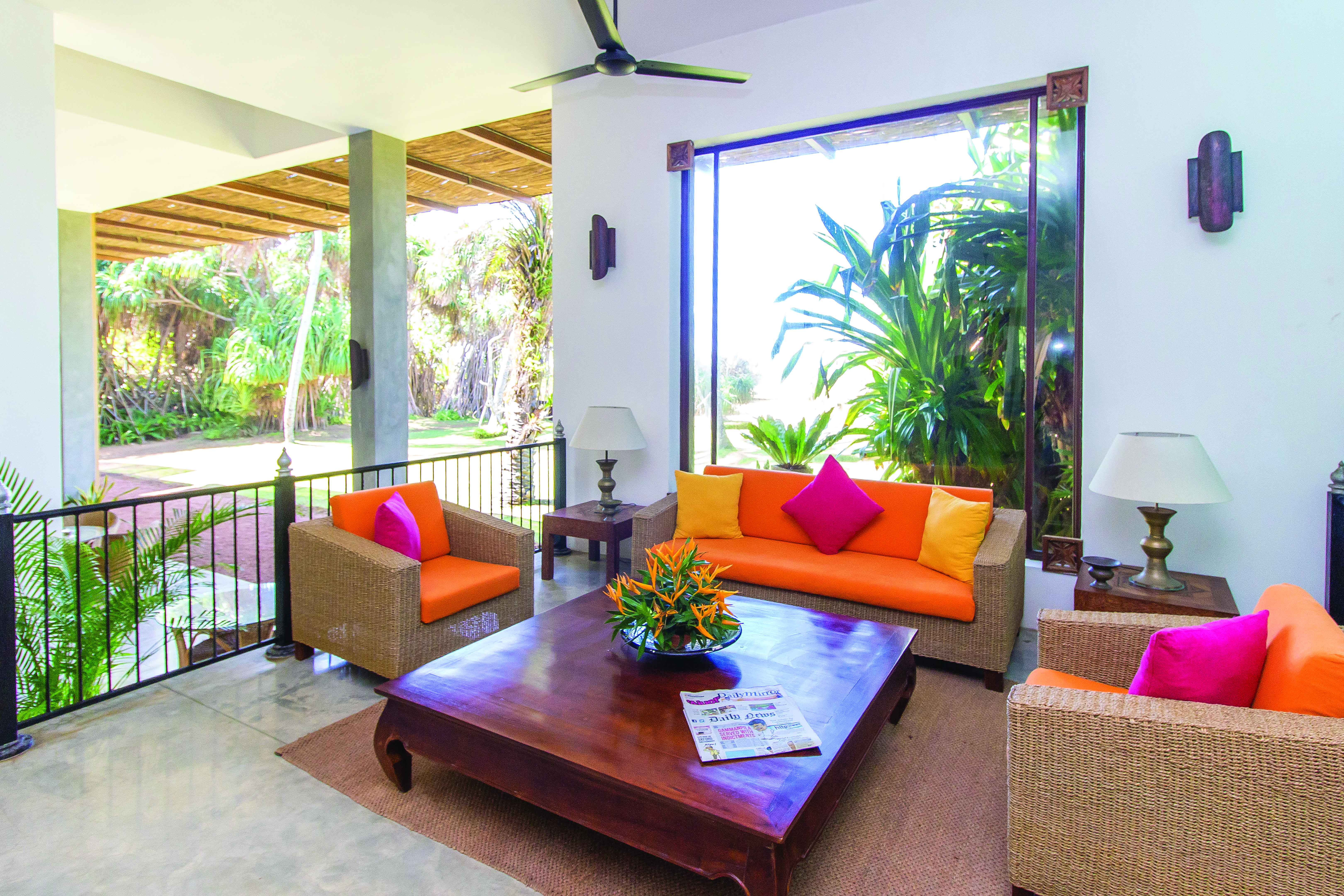 Aditya Resort verandah, wicker sofa and armchairs