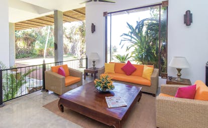 Aditya Resort verandah, wicker sofa and armchairs