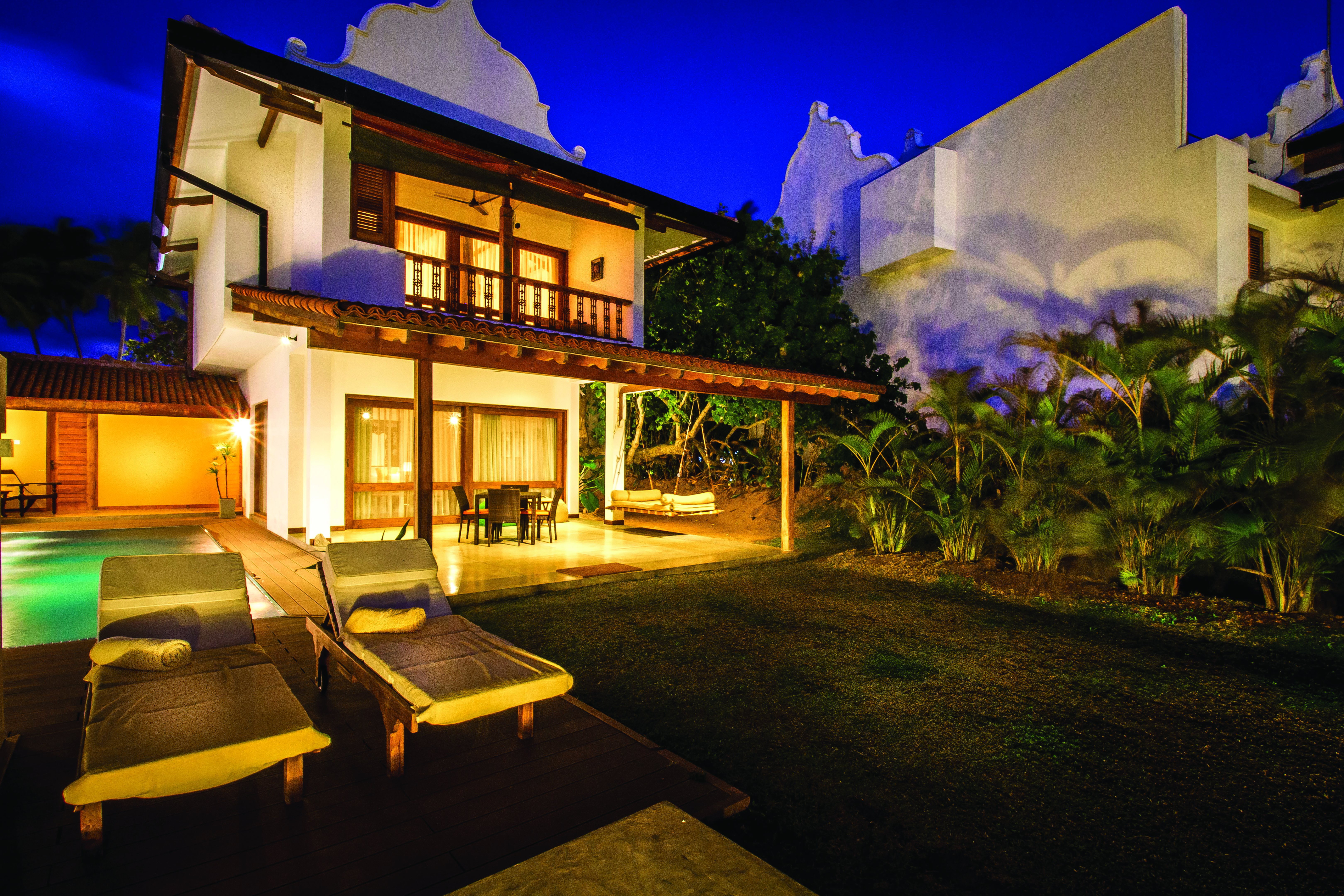 Aditya Resort villa exterior, verandah, pool, sun loungers