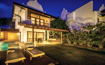 Aditya Resort villa exterior, verandah, pool, sun loungers