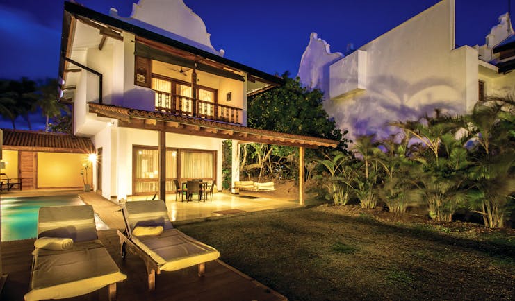 Aditya Resort villa exterior, verandah, pool, sun loungers