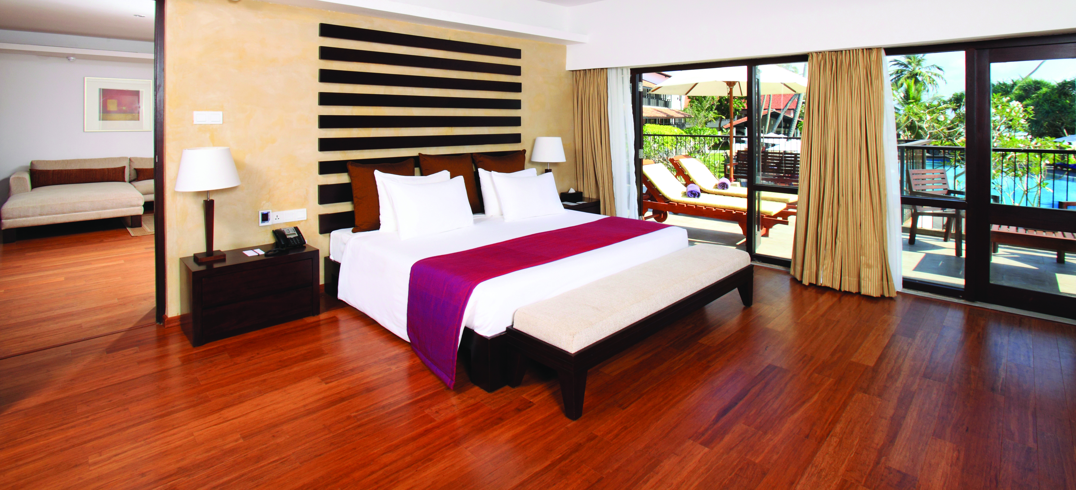 Avani Bentota Sri Lanka avani suite bed separate lounge area modern décor private terrace