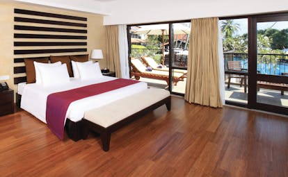 Avani Bentota Sri Lanka avani suite bed separate lounge area modern décor private terrace