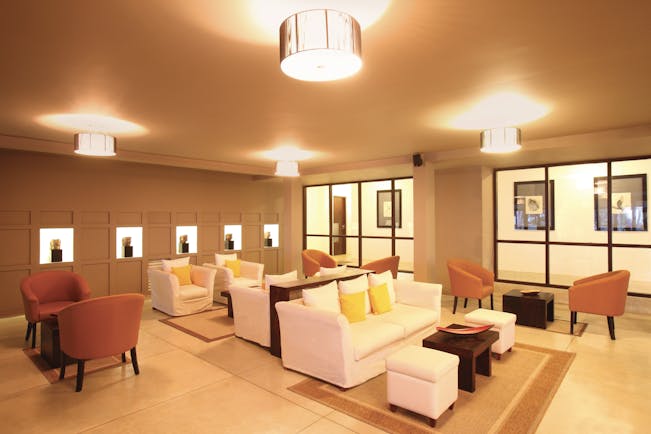Avani Bentota Sri Lanka lounge indoor communal seating area sofas chairs chic modern decor 