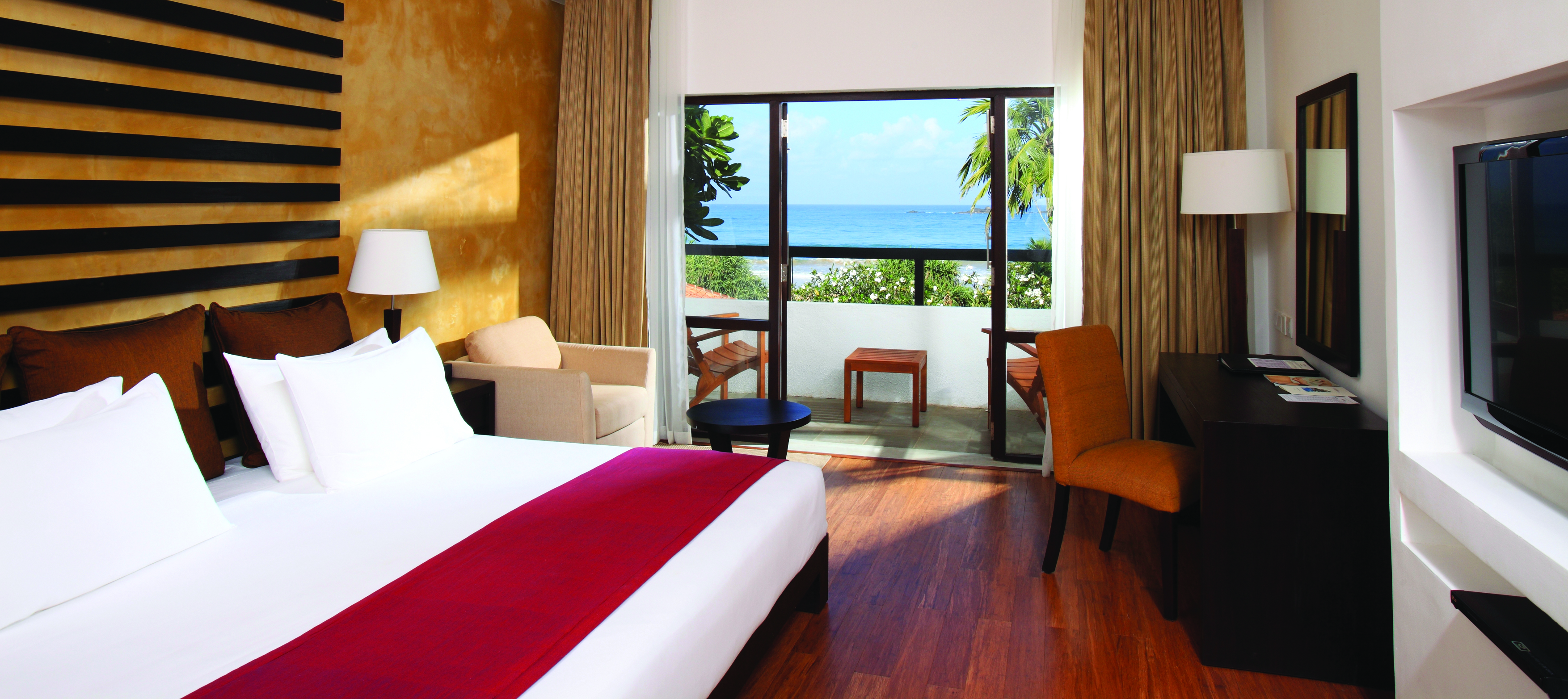 Avani Bentota Sri Lanka superior room bed armchair modern décor private terrace