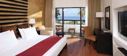 Avani Bentota Sri Lanka superior room bed armchair modern décor private terrace