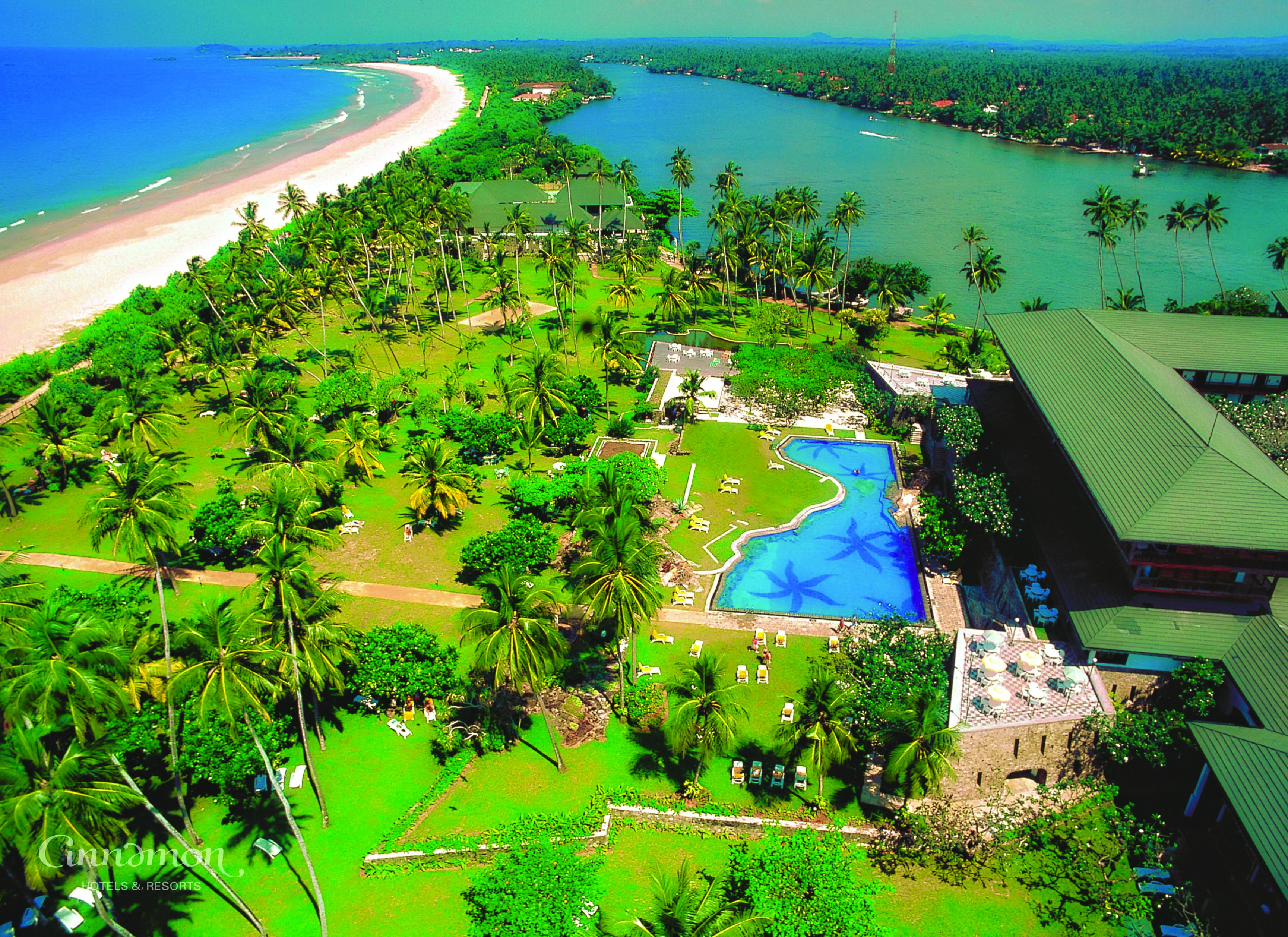 Bentota Beach Sri Lanka aerial shot of resort hotel building pool lake beach gardens