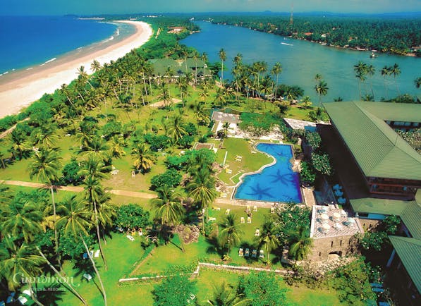 Bentota Beach Sri Lanka aerial shot of resort hotel building pool lake beach gardens