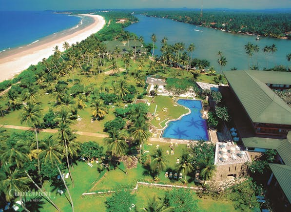Bentota Beach Sri Lanka aerial shot of resort hotel building pool lake beach gardens