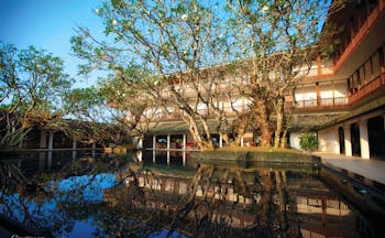 Bentota Beach Sri Lanka exterior hotel building water feature trees