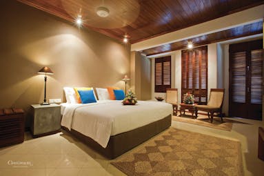 Bentota Beach Sri Lanka guestroom bed armchairs modern décor