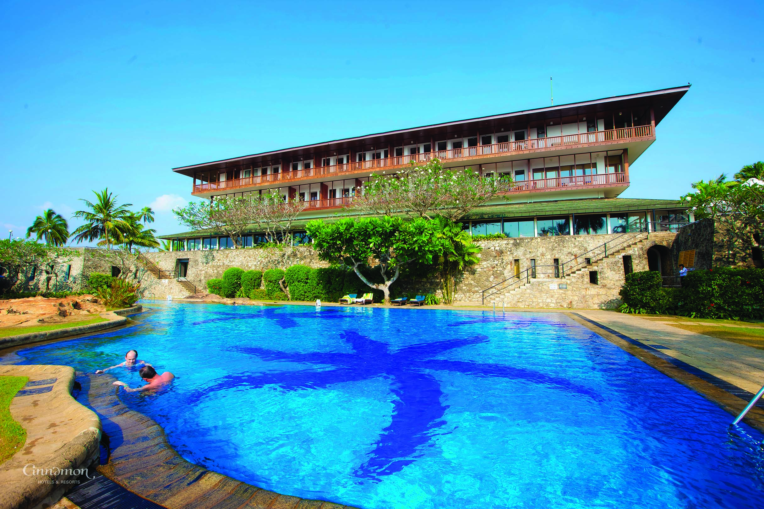 Bentota Beach Sri Lanka pool hotel building in background trees