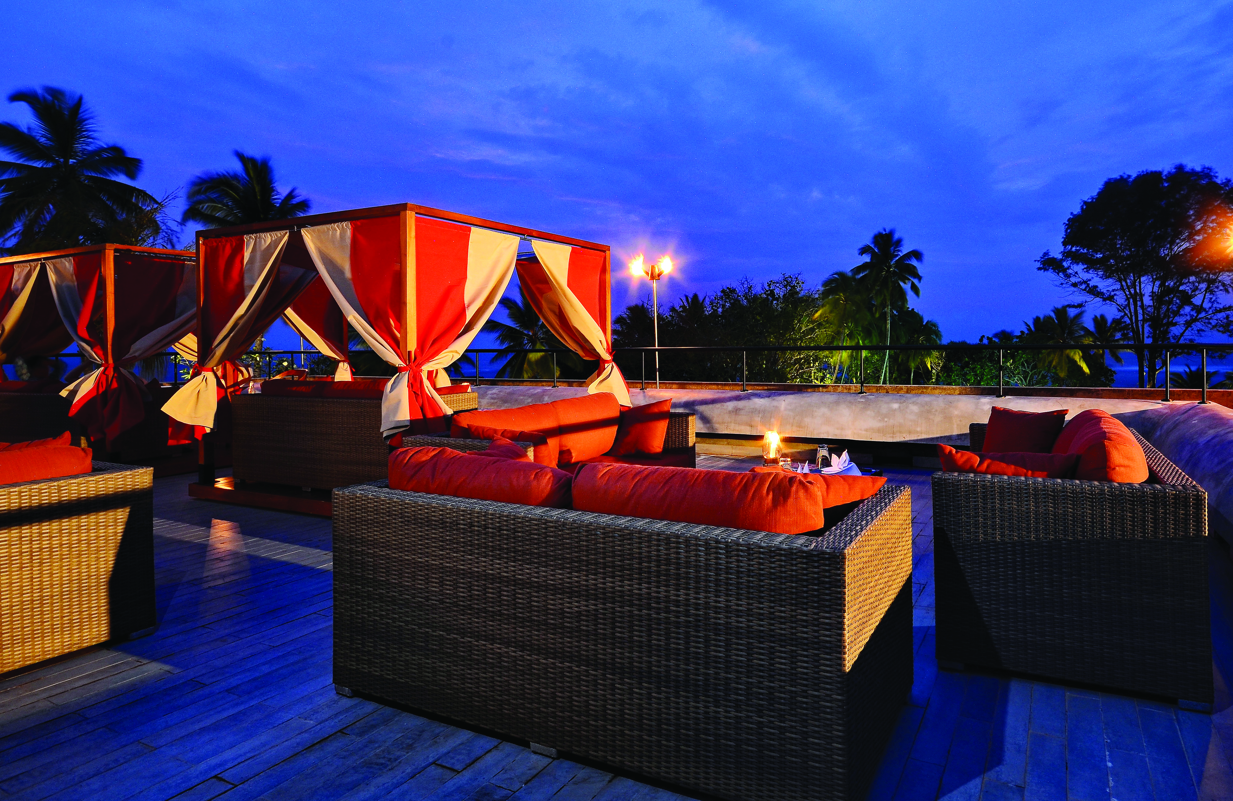 Cinnamon Bey Sri Lanka rooftop terrace sofas night lights