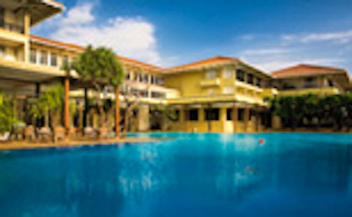 Outdoor pool and view of hotel 