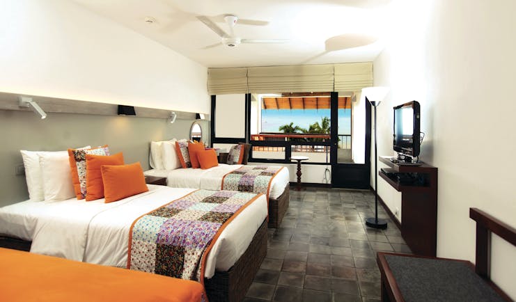 Hikka Tranz Sri Lanka superior room two beds modern décor access to private terrace