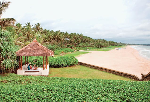 Saman Villas Sri Lanka beach sand palm trees meditation hut