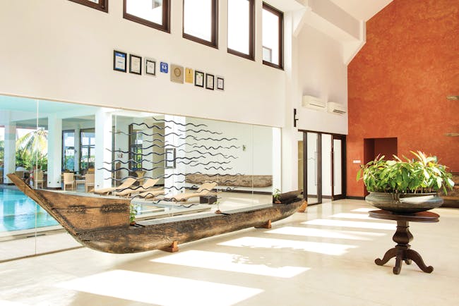 Shinagawa Beach Sri Lanka lobby antique boat bright modern décor