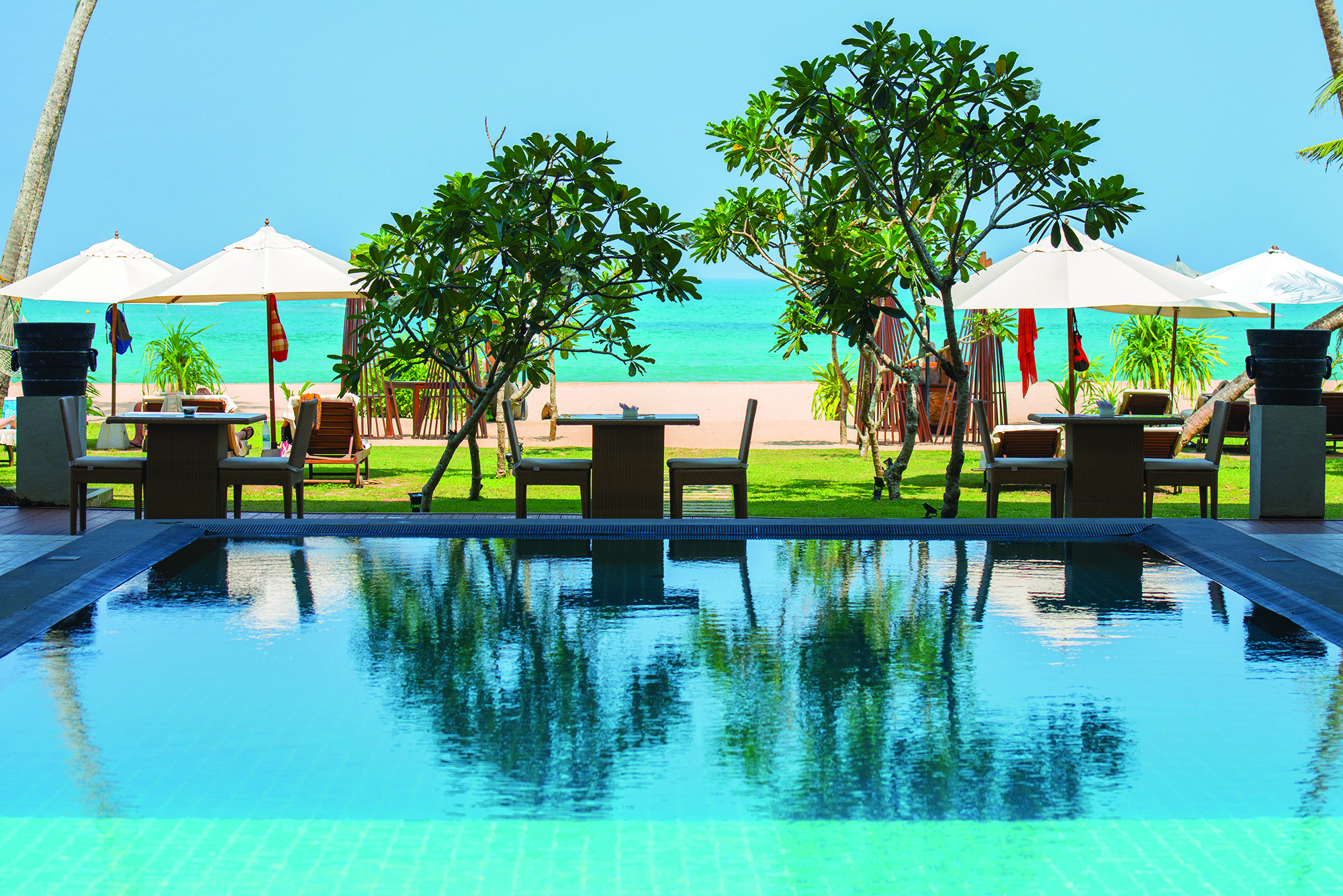 Shinagawa Beach Sri Lanka pool lawns beach in background poolside seating