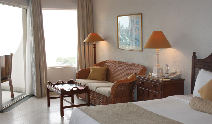 Taj Bentota Sri Lanka orchid room wicker sofa balcony