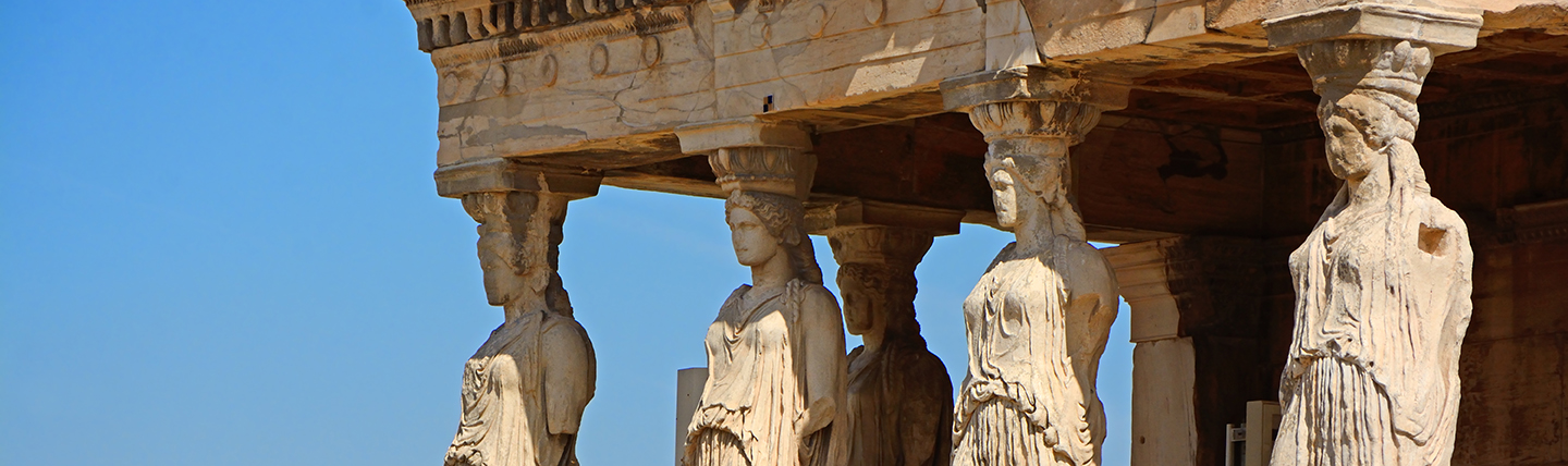 Female statues with roof of temple on heads Athens Acropolis