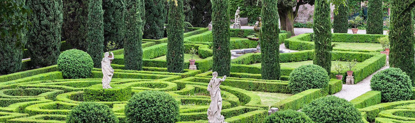 Symmetrical formal gardens of box and cypress in Verona