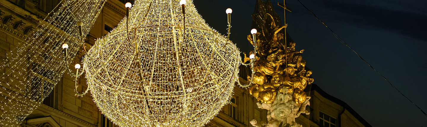 Golden coloured lights against dark sky